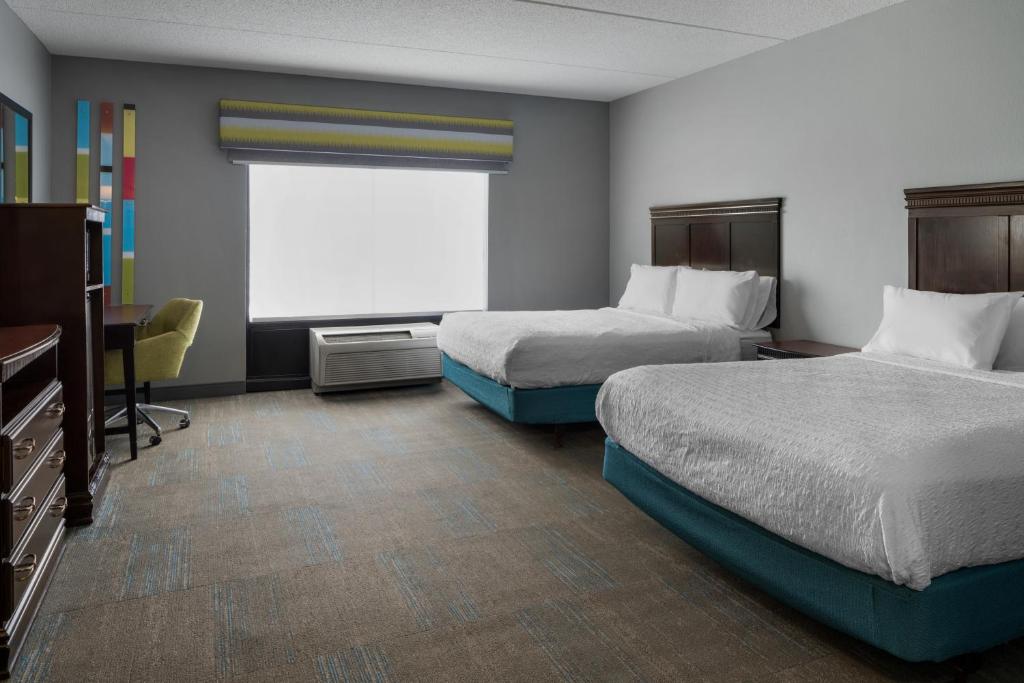 Postel nebo postele na pokoji v ubytování Hampton Inn Rochester - Irondequoit