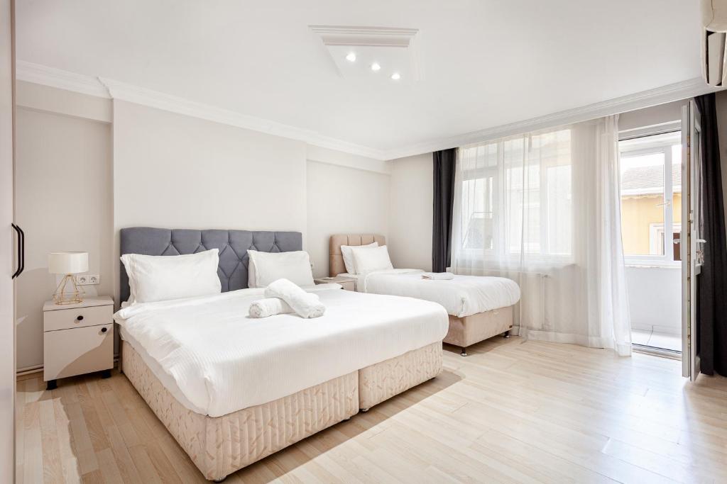 Postel nebo postele na pokoji v ubytování Charming Spacious 4 Big rooms with Sweet king beds