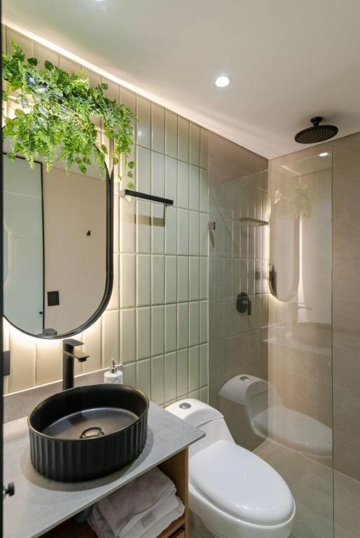 Koupelna v ubytování Obo Hotel