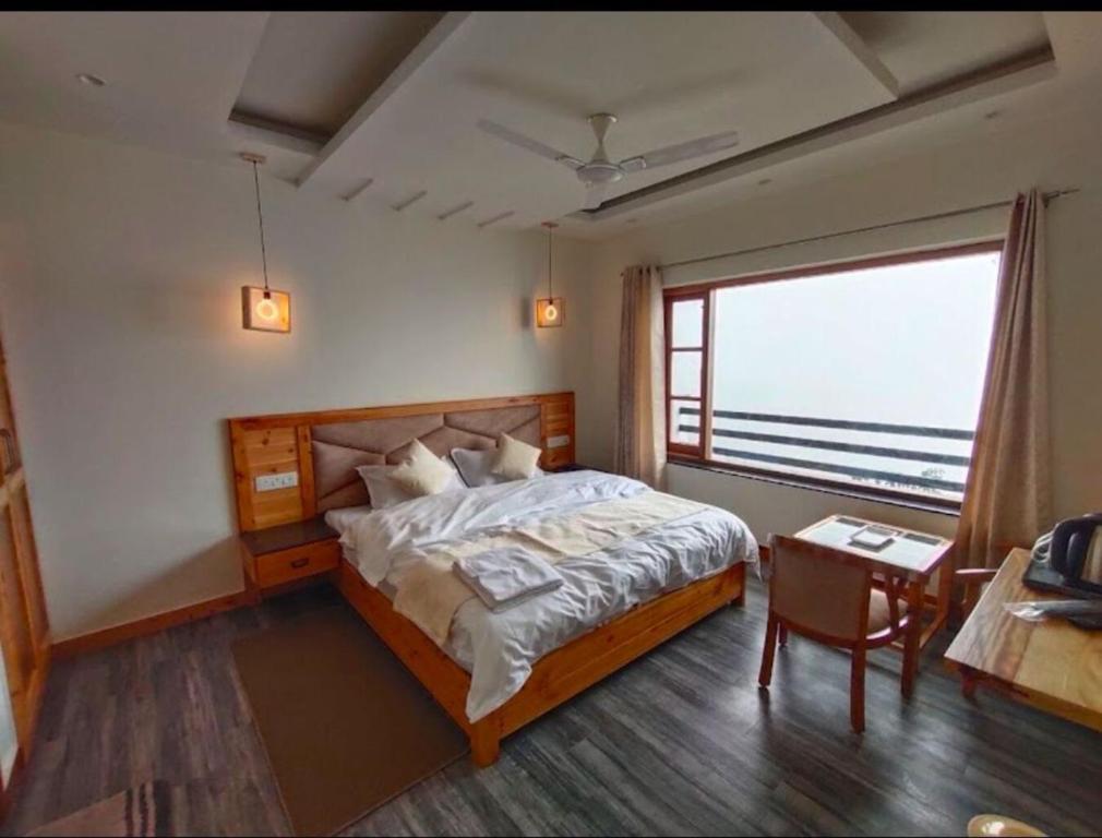 Voodi või voodid majutusasutuse The Boho Mussoorie toas