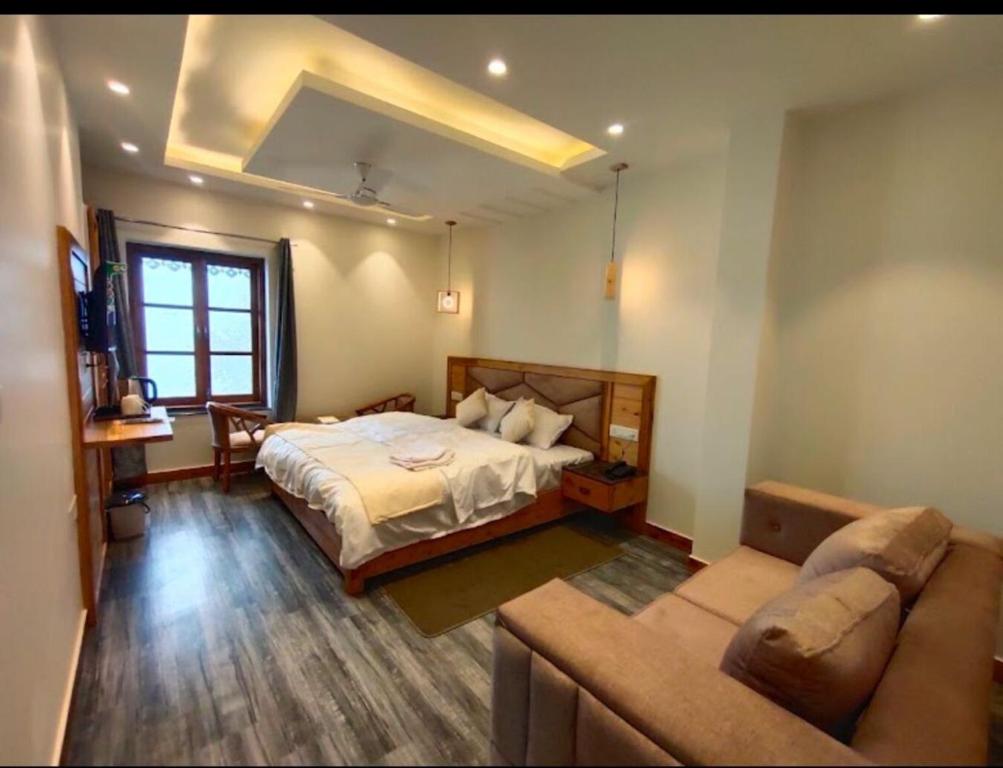 Voodi või voodid majutusasutuse The Boho Mussoorie toas