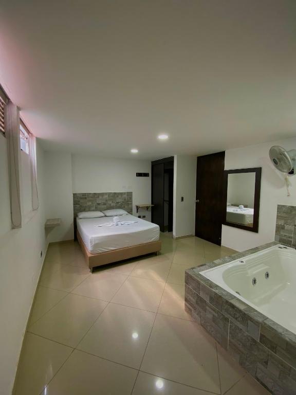 Postel nebo postele na pokoji v ubytování Hotel Buenos Aires Central