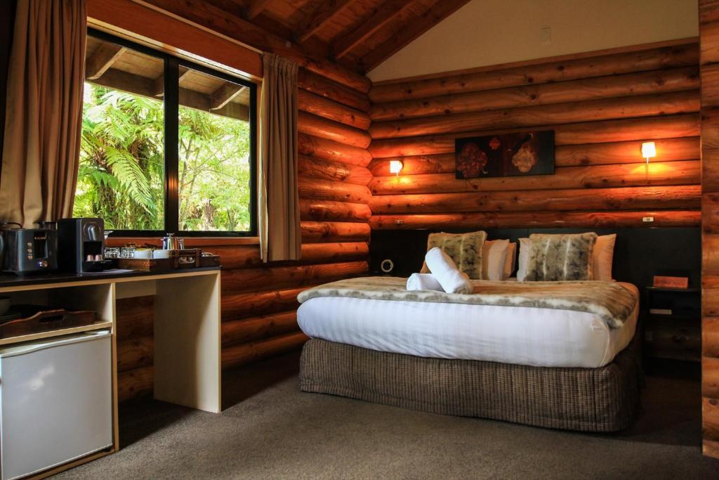 Postel nebo postele na pokoji v ubytování Rainforest Retreat