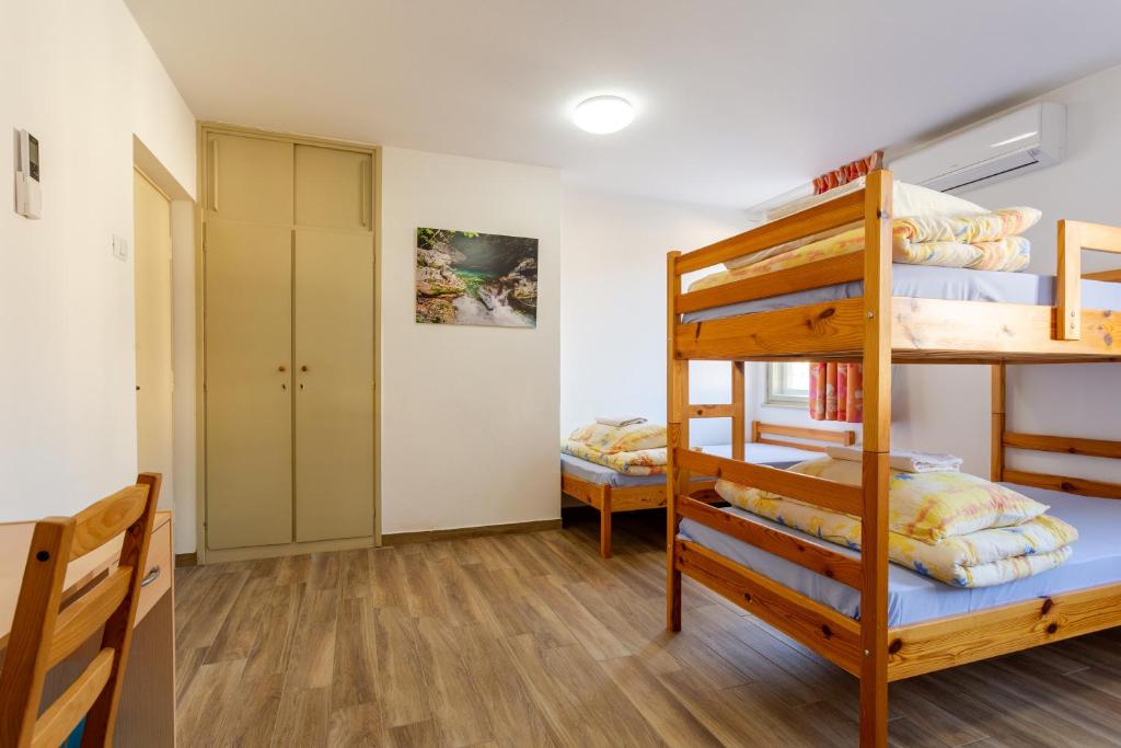 Postel nebo postele na pokoji v ubytování Yapka Rooms