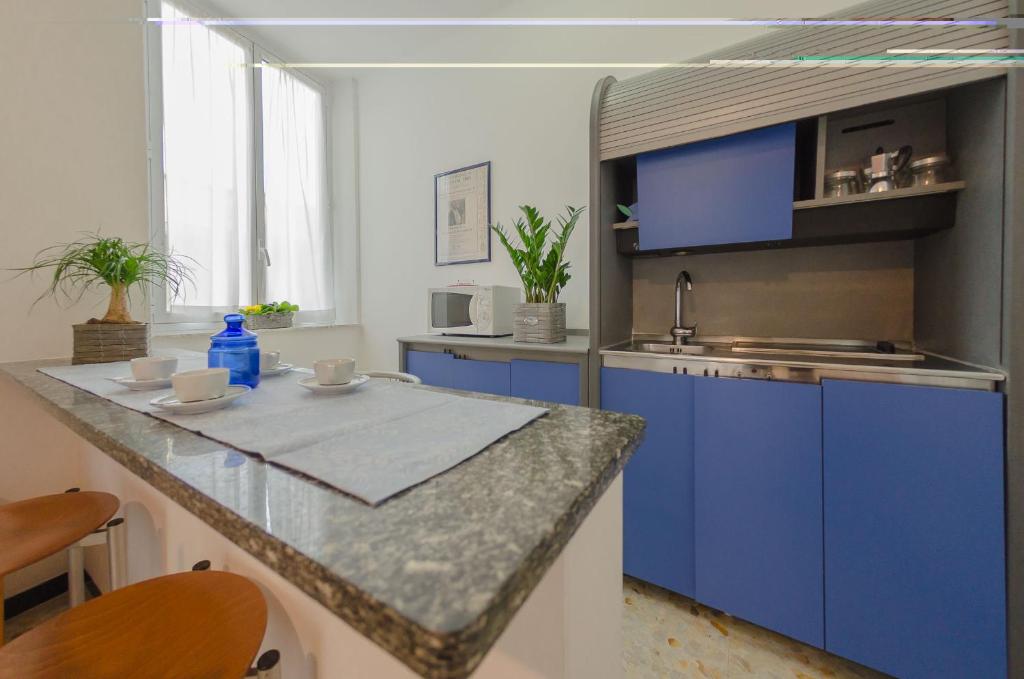 Kuchyň nebo kuchyňský kout v ubytování Residenza Adelaide