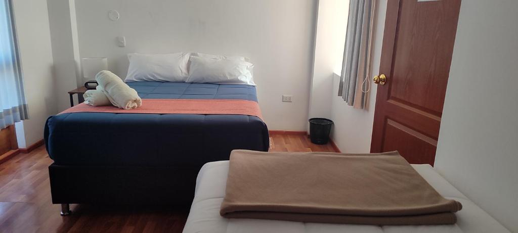 Ένα ή περισσότερα κρεβάτια σε δωμάτιο στο Anata Hotel
