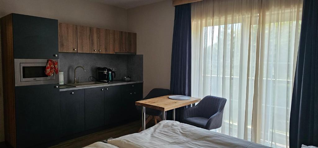 Kuchyň nebo kuchyňský kout v ubytování apartmány Špacír