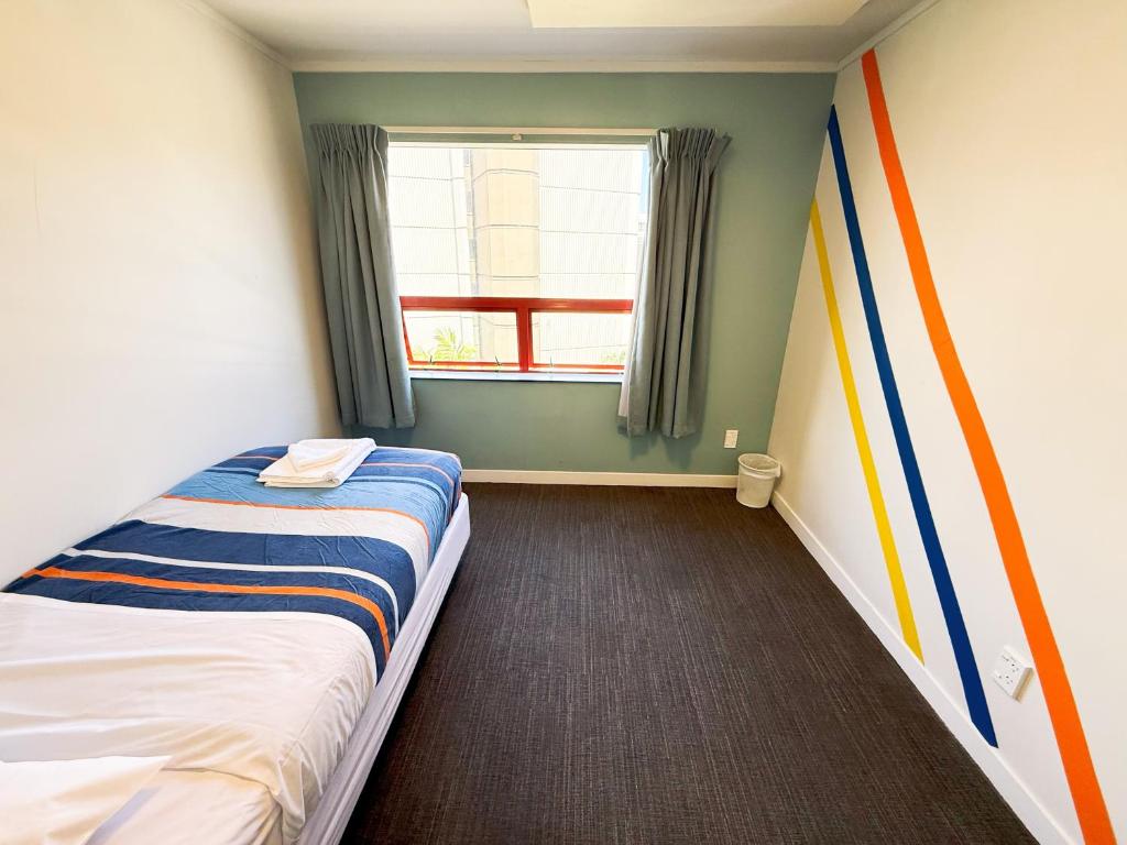 Letto o letti in una camera di United Auckland