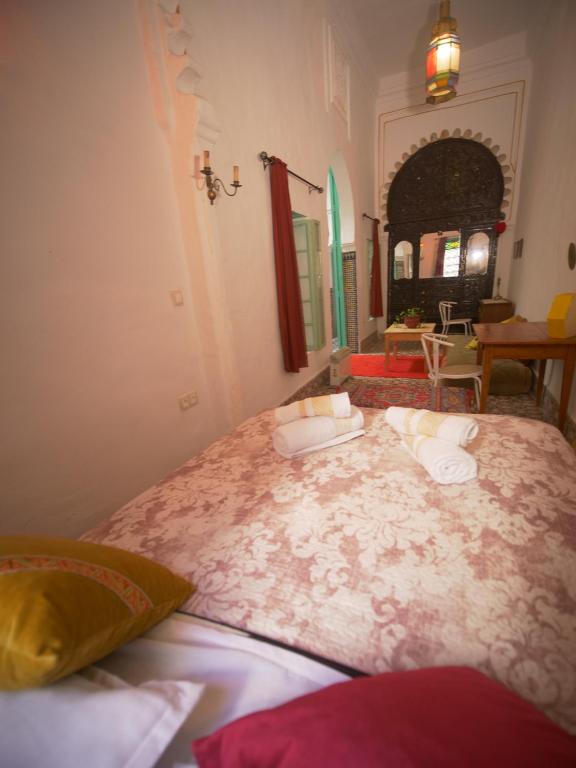 Ένα ή περισσότερα κρεβάτια σε δωμάτιο στο Riad Nostalgie of Tetouan