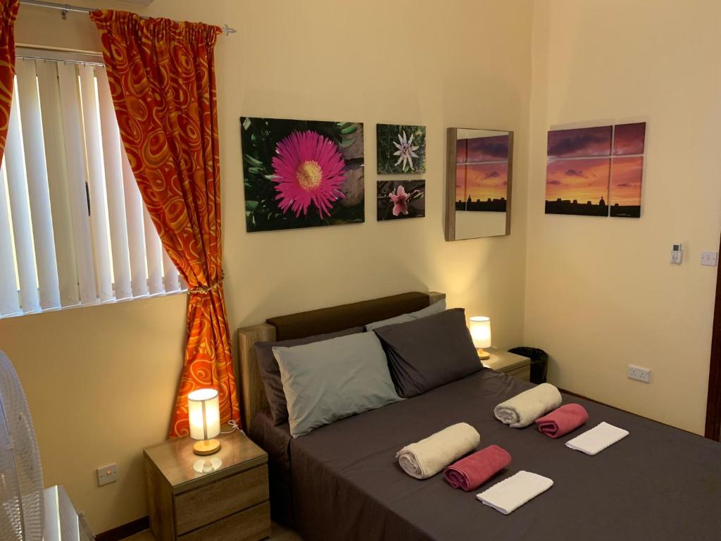 Postel nebo postele na pokoji v ubytování Cloud 9 Residence
