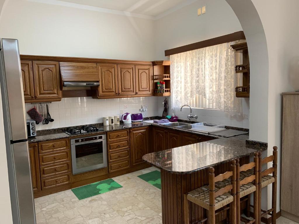 Kuchyň nebo kuchyňský kout v ubytování Cloud 9 Residence