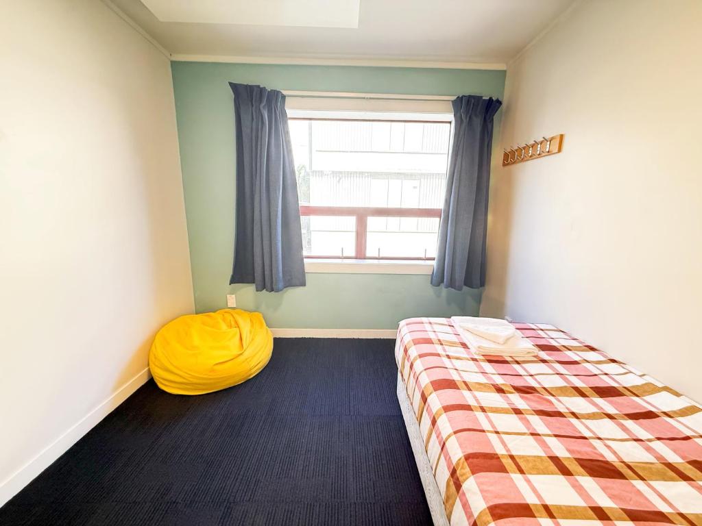 Letto o letti in una camera di United Auckland