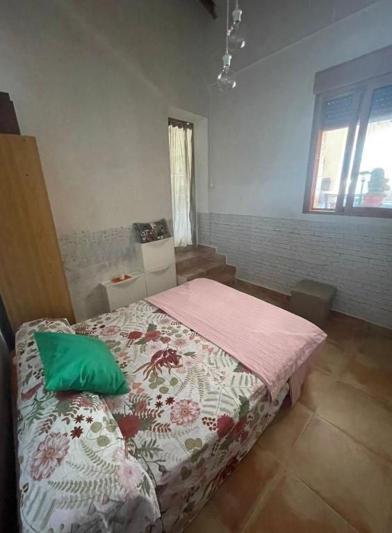 Postel nebo postele na pokoji v ubytování Cortijo de la montaña