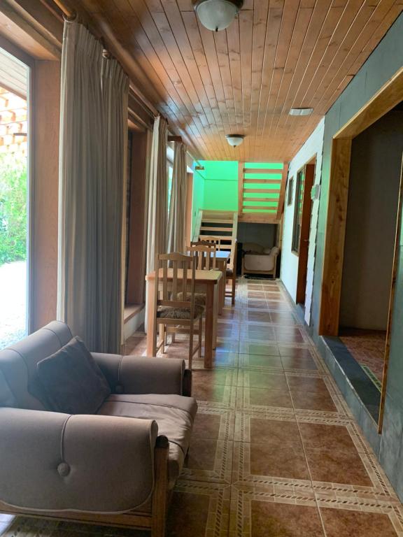 Χώρος καθιστικού στο Hostal Tour Pucon