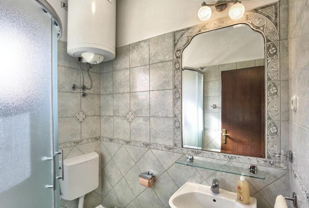 Kúpeľňa v ubytovaní Apartments Branka