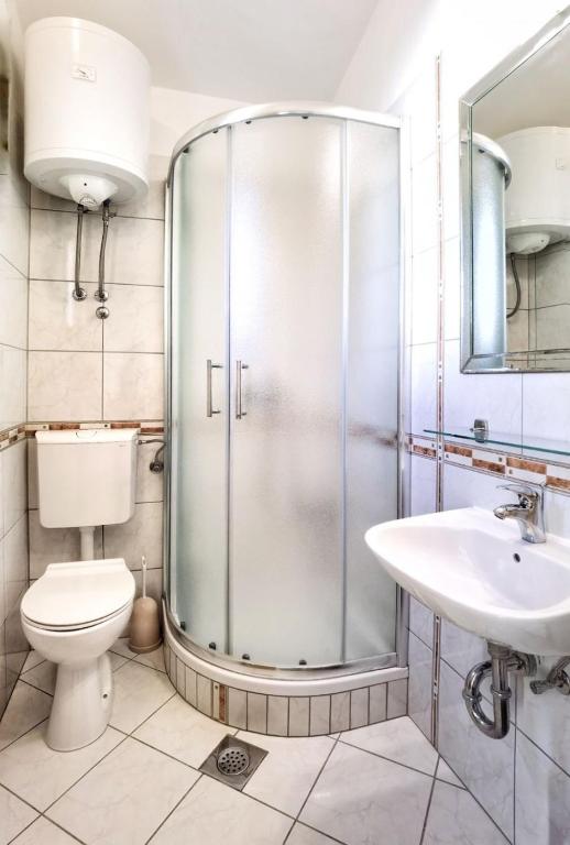 Kúpeľňa v ubytovaní Apartments Branka