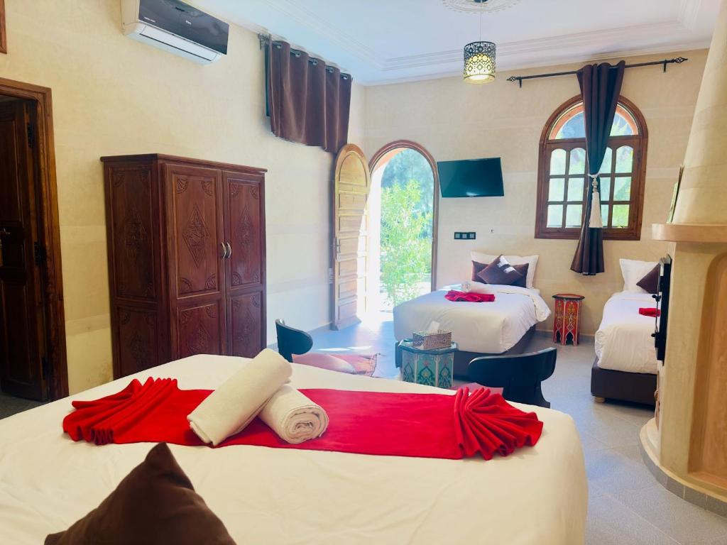 Postel nebo postele na pokoji v ubytování Aurocher Marrakech Ourika Oukaimeden