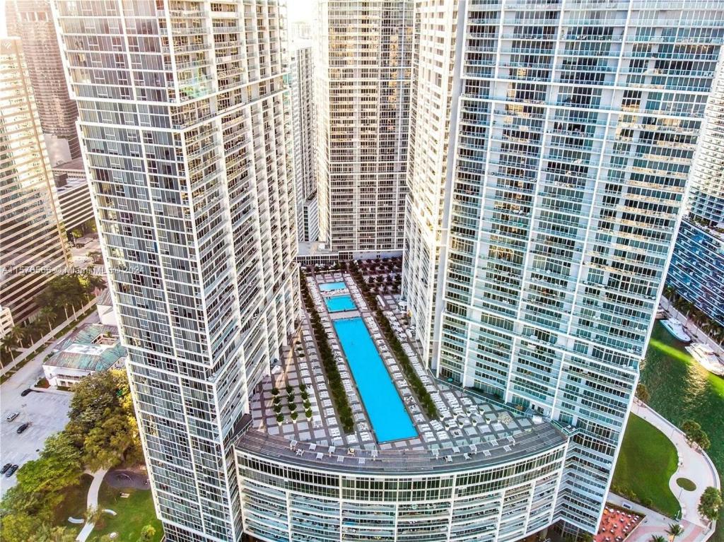 an overhead view of a large building with a pool in it at Sky High Penthouse Corner 2BR 2BA Icon Brickell in Miami