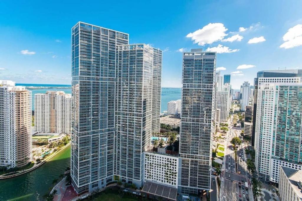 an aerial view of a city with tall buildings at Sky High Penthouse Corner 2BR 2BA Icon Brickell in Miami
