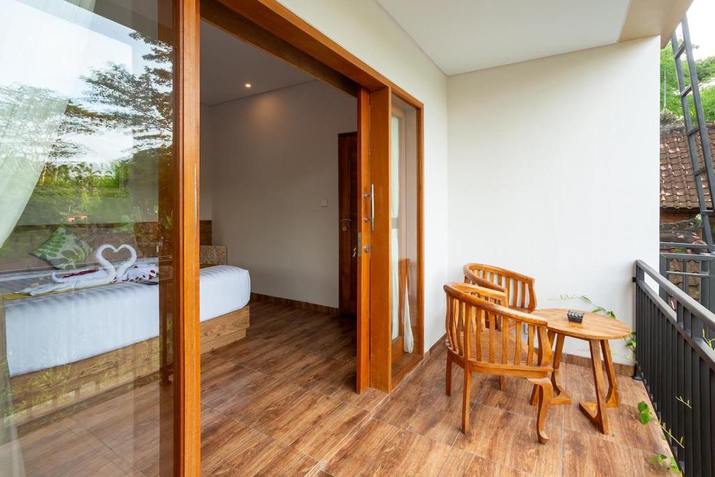Balkón nebo terasa v ubytování Graha Shanti Guest House