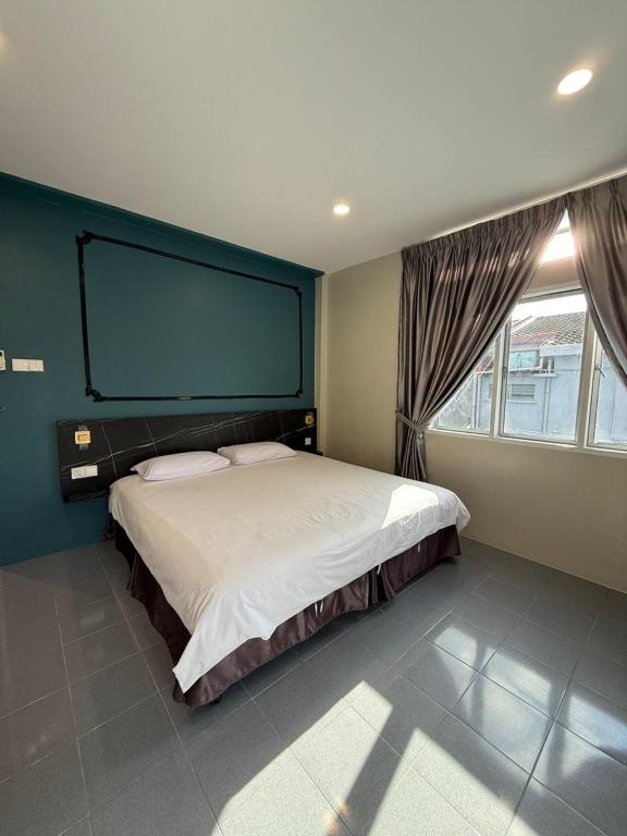 Postel nebo postele na pokoji v ubytování HOTEL MIRAMA 美麗華酒店