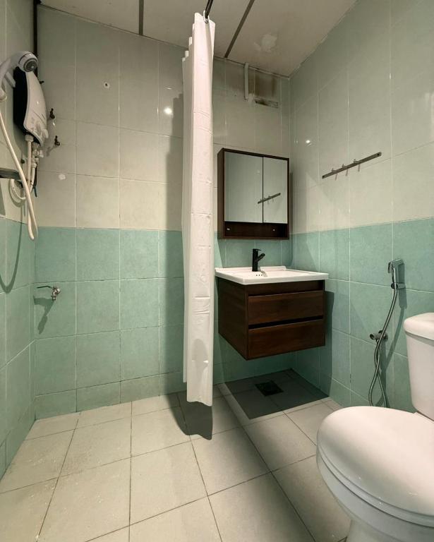 Koupelna v ubytování HOTEL MIRAMA 美麗華酒店