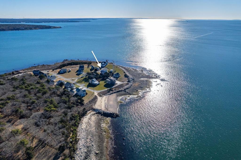 an aerial view of an island in the water at Pocasset Family retreat ocean view in Bourne
