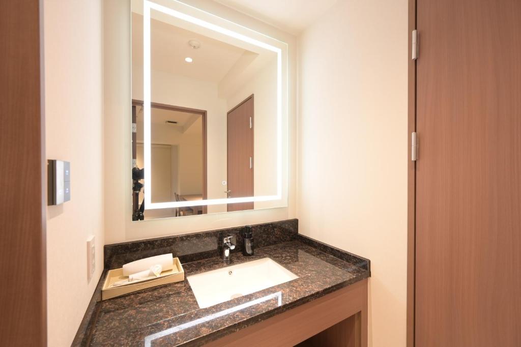 Koupelna v ubytování COCOYO Hotel 大塚