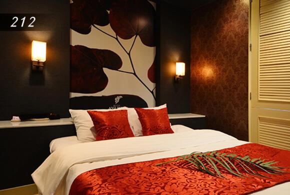 Postel nebo postele na pokoji v ubytování Hotel Ayung 大人専用
