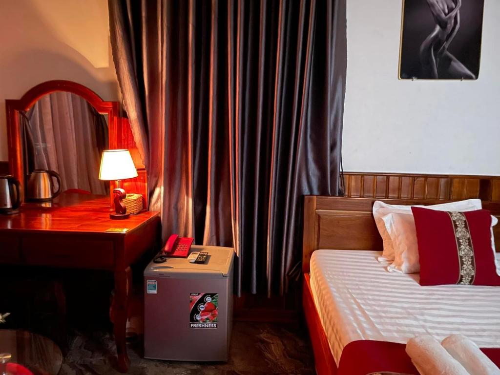 Postel nebo postele na pokoji v ubytování Nha Trang Homestay Đồng Nai