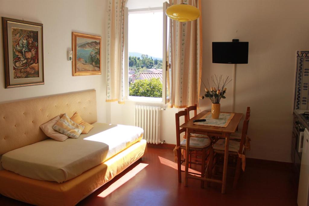 TV a/nebo společenská místnost v ubytování Residenza La Limonaia