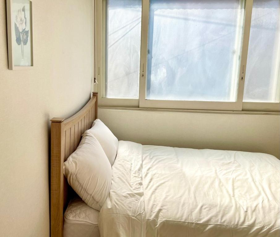 Postel nebo postele na pokoji v ubytování Slow Stay, #SK Hynix#5 minutes to Chungnam National University#10 minutes to Terminal#Hotel Bedding