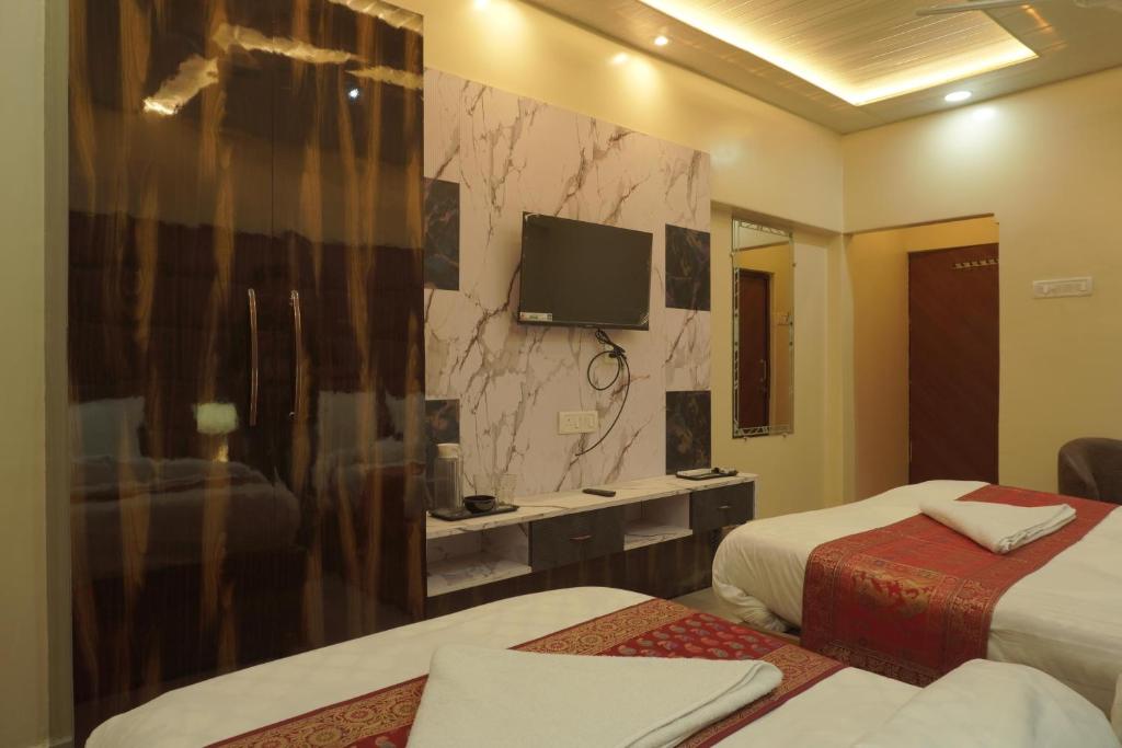 TV a/nebo společenská místnost v ubytování Classy5 Guest House
