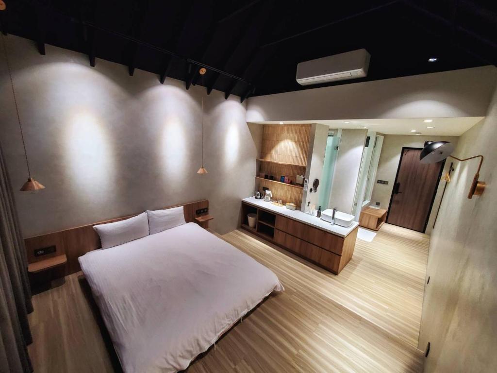 Postel nebo postele na pokoji v ubytování Zu Sin Garden B&B