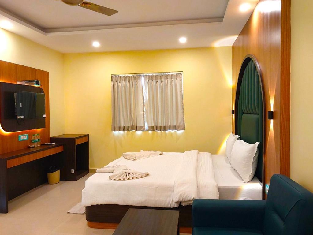Postel nebo postele na pokoji v ubytování Sonargaon Beach Resort