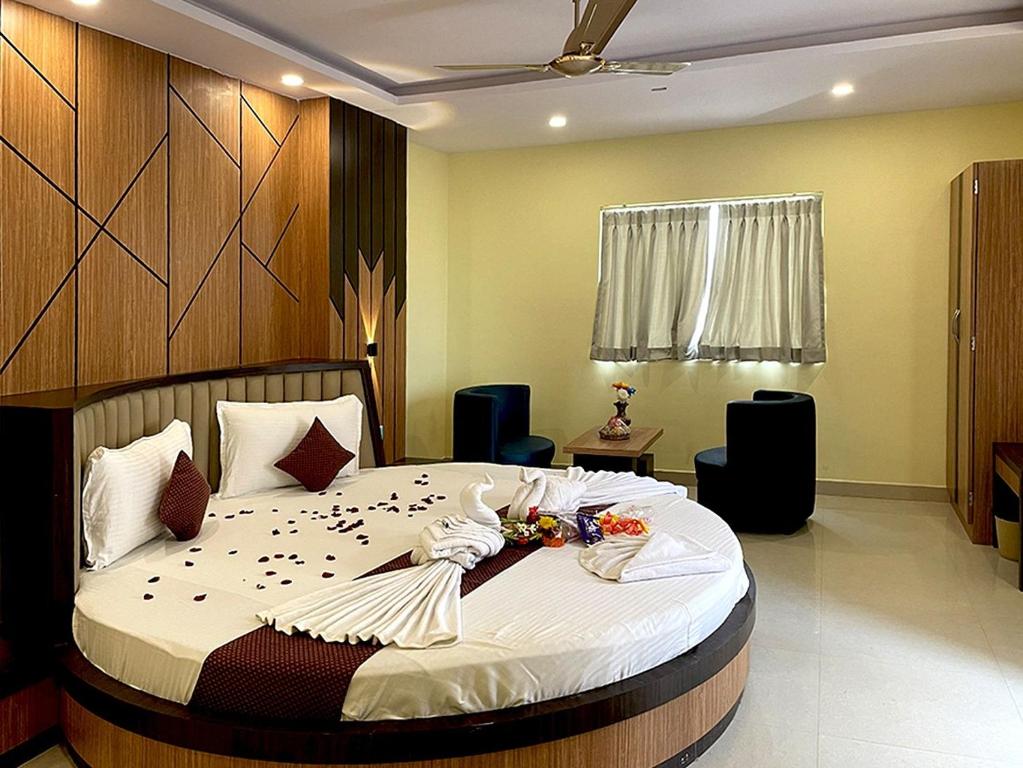 Postel nebo postele na pokoji v ubytování Sonargaon Beach Resort