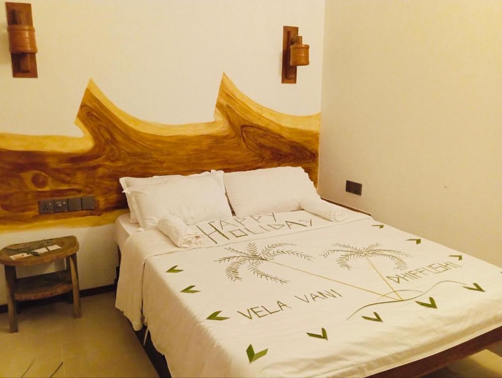 Postel nebo postele na pokoji v ubytování The Turtle Hive Maldives - Velaa Vani Dhiffushi