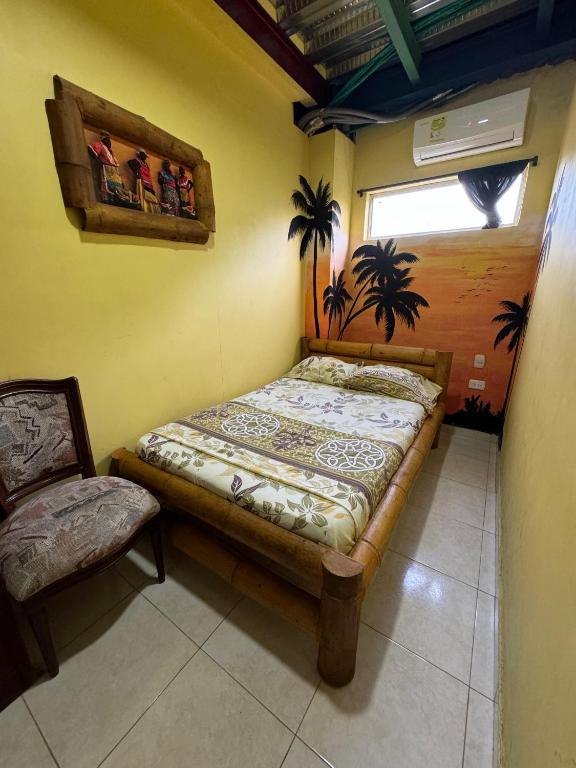 Postel nebo postele na pokoji v ubytování Hostal Bambumar
