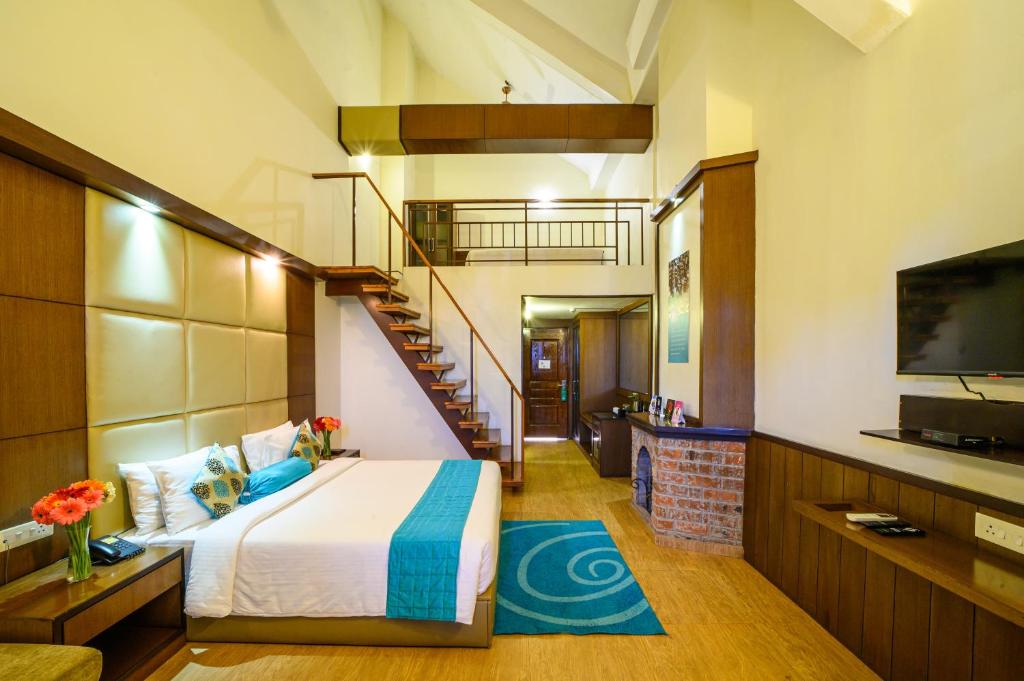 Postel nebo postele na pokoji v ubytování Sinclairs Retreat Kalimpong
