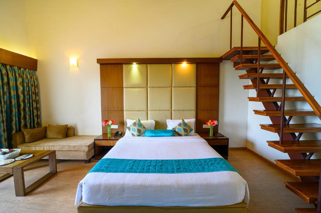 Postel nebo postele na pokoji v ubytování Sinclairs Retreat Kalimpong