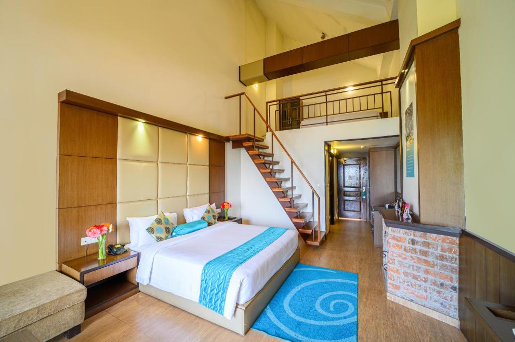 Postel nebo postele na pokoji v ubytování Sinclairs Retreat Kalimpong