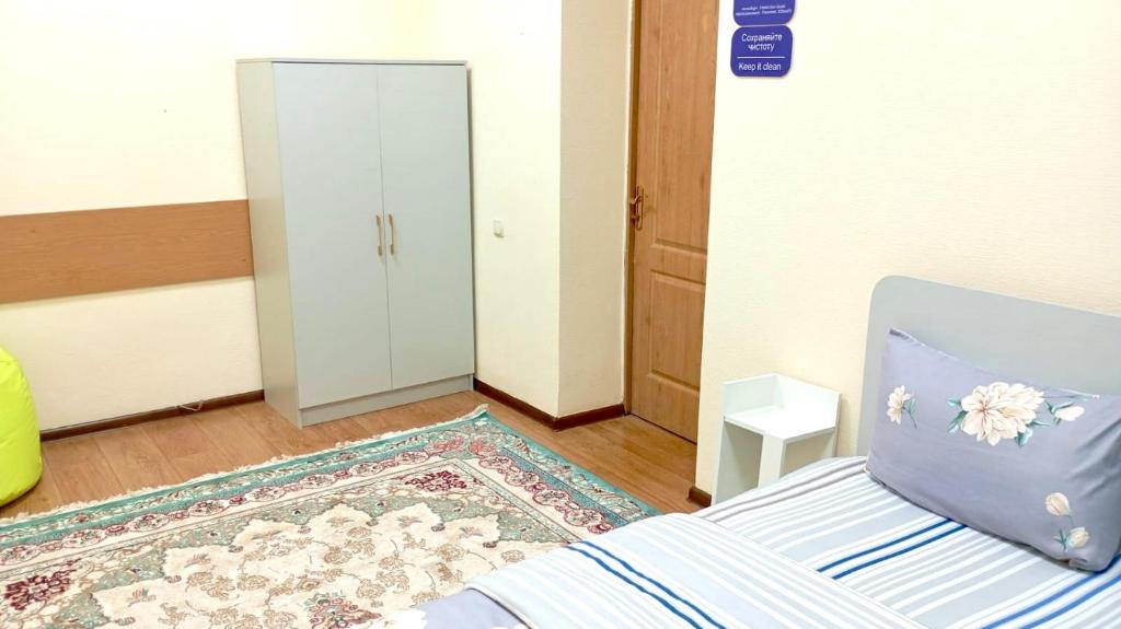 Postel nebo postele na pokoji v ubytování Sun Hostel