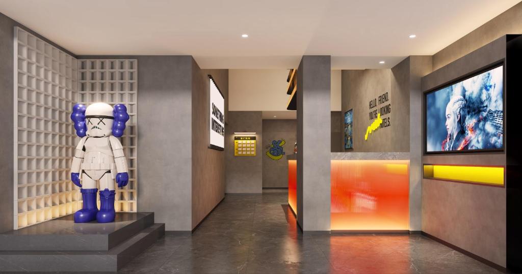 TV a/nebo společenská místnost v ubytování Mcsrh Hotel-Shenzhen Liutang