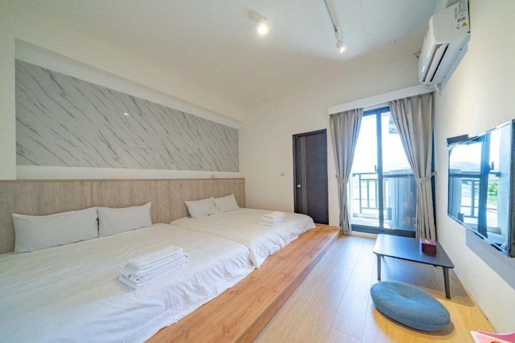 Postel nebo postele na pokoji v ubytování Namek Guesthouse
