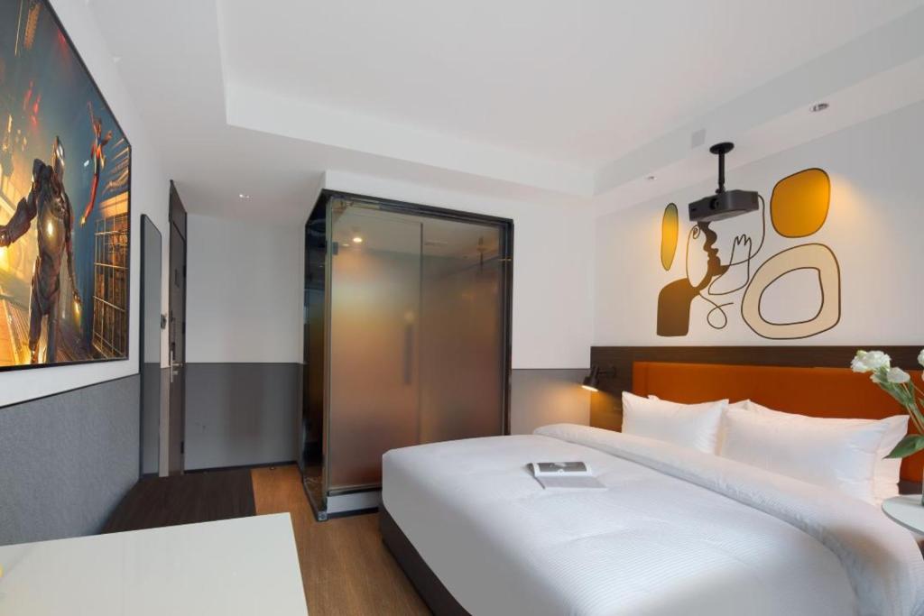 Postel nebo postele na pokoji v ubytování Mcsrh Hotel-Shenzhen Liutang
