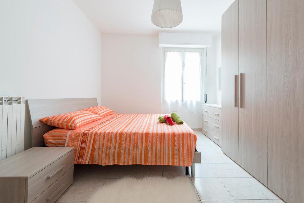 Posteľ alebo postele v izbe v ubytovaní Rogoredo Apartments