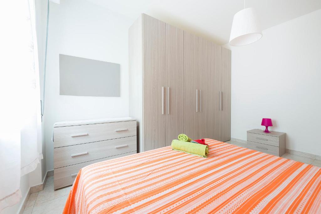 Posteľ alebo postele v izbe v ubytovaní Rogoredo Apartments