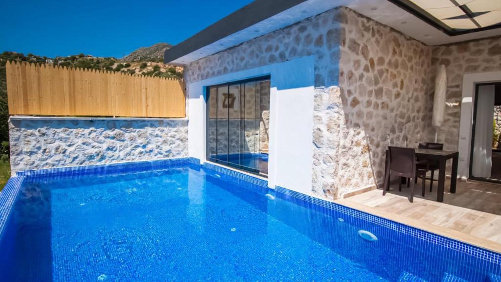 Bazén v ubytování Kalkan 1 Bedroom Villa 1151 nebo v jeho okolí