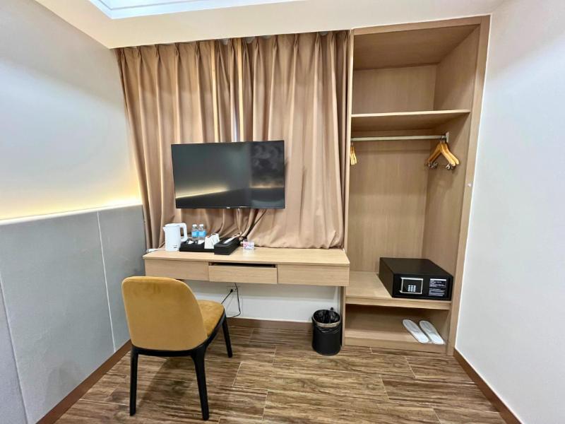 TV a/nebo společenská místnost v ubytování L' Asuncion Hotel