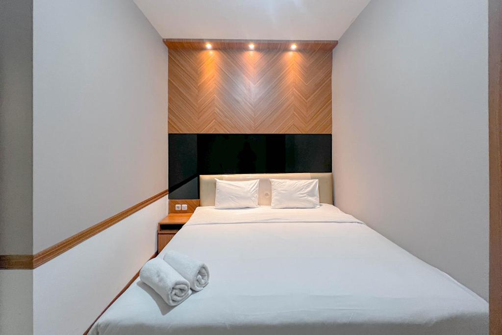 Ένα ή περισσότερα κρεβάτια σε δωμάτιο στο Best Price and Good Location 1BR at Bale Hinggil Apartment By Travelio